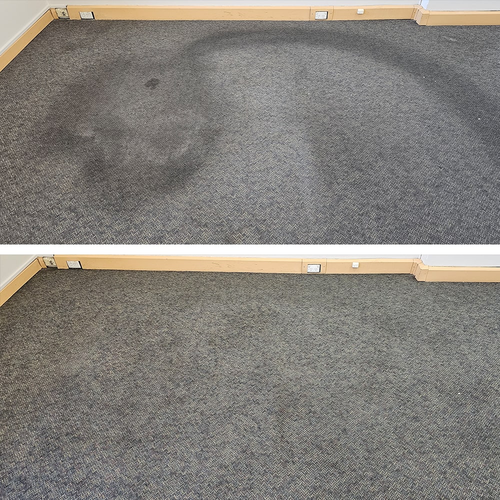 A large spill ring spreading across grey office carpet in Perth, cleaned out with no edge left behind
