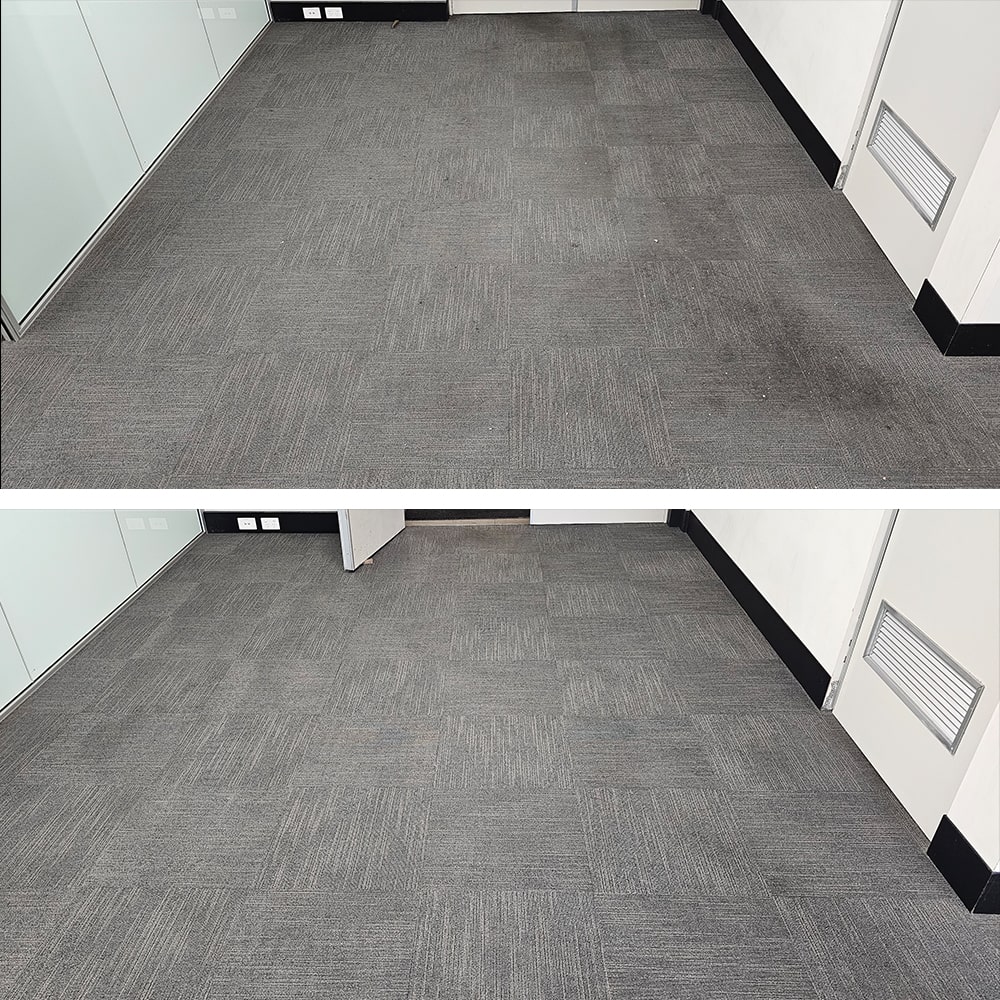 Traffic soil darkening the carpet tiles of a Perth office corridor, cleaned out to bring back the light grey finish