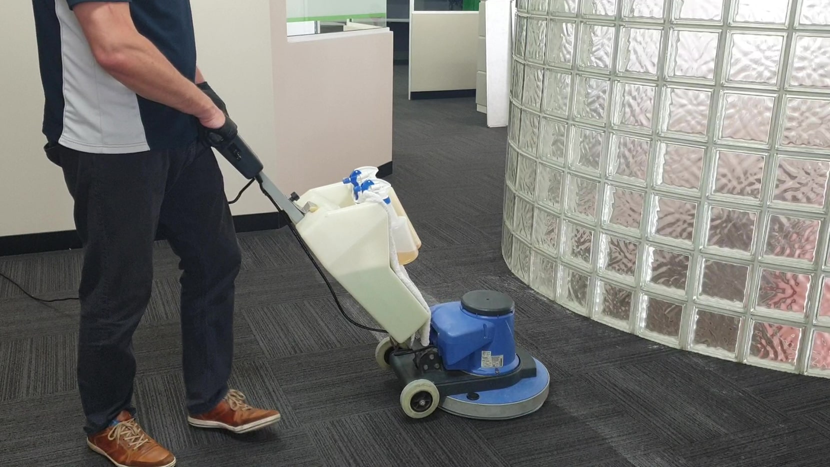 Carpet cleaned around a curved glass block wall in a Perth office, our scrubbing machine reaching right to the base