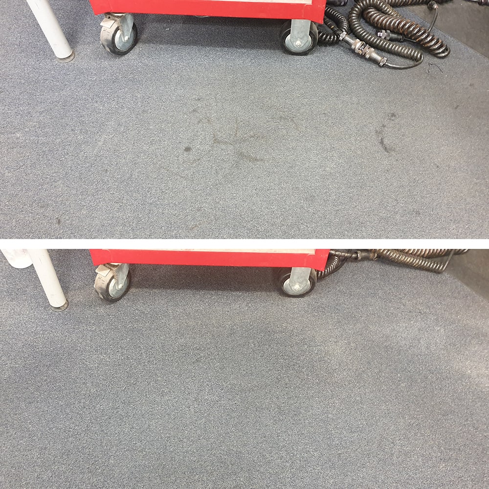 Grease marks and workshop grime cleaned from blue grey carpet in a Perth workshop, the floor presentable again