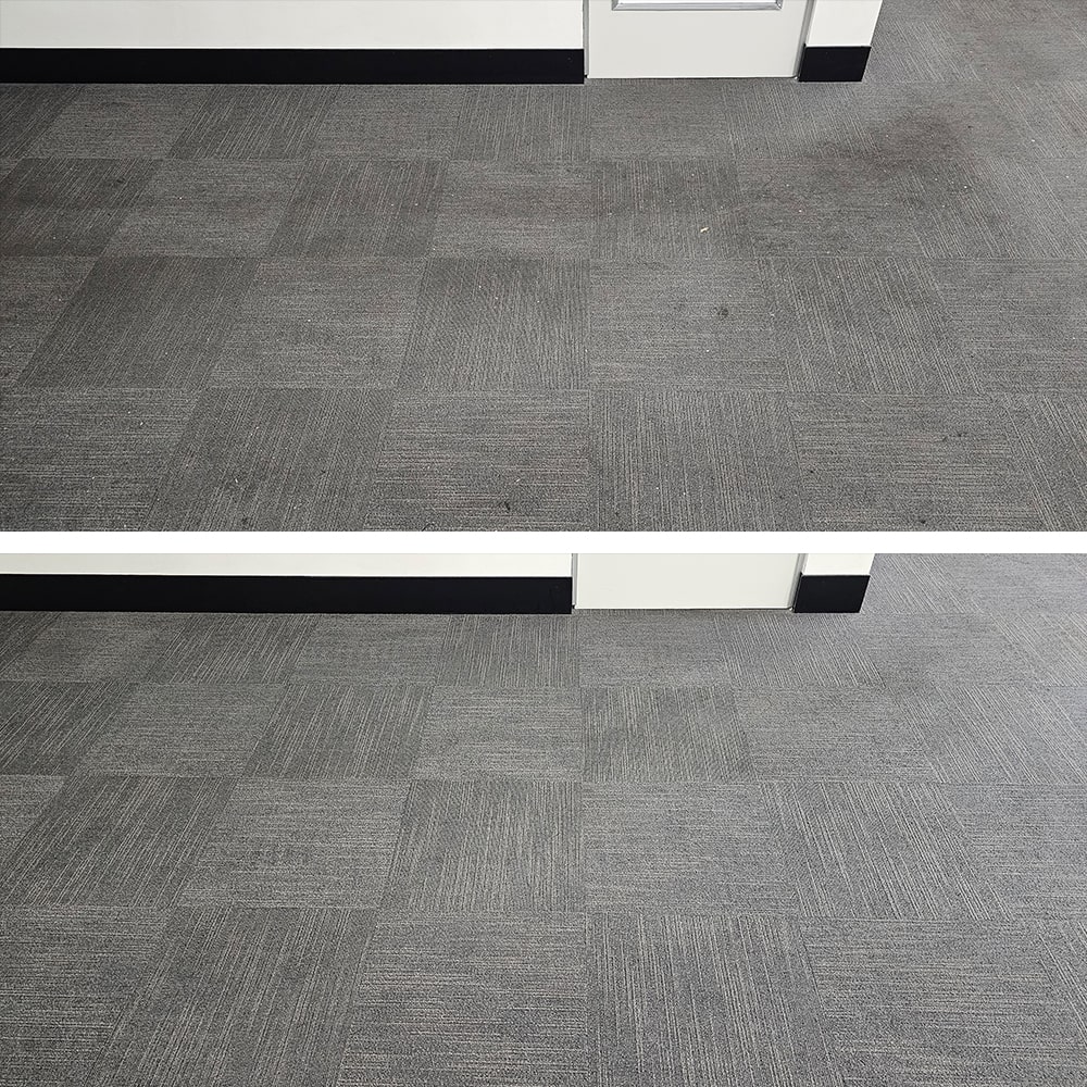 Traffic soil gathered at a Perth office door, cleaned from grey carpet tiles to bring the entry back in line with the room