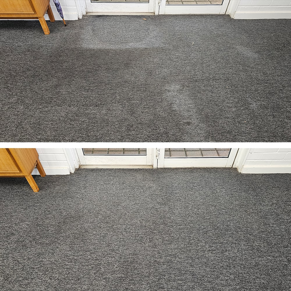 Entry traffic soil cleaned from charcoal carpet at a Perth office doorway, so the first steps inside look fresh