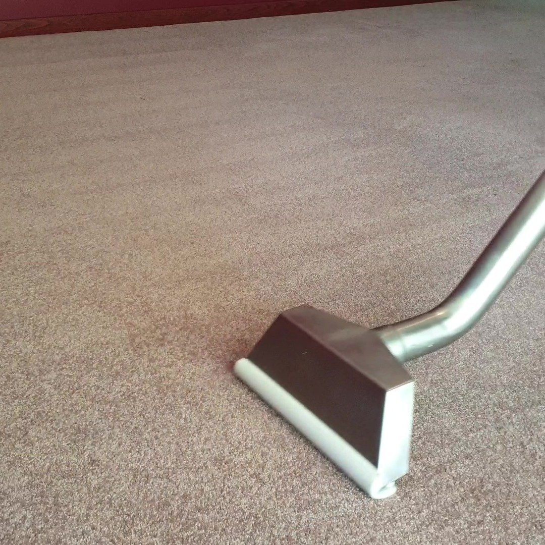The soft, even finish hot water extraction leaves on beige carpet in Perth, with our steam cleaning wand still on the floor.