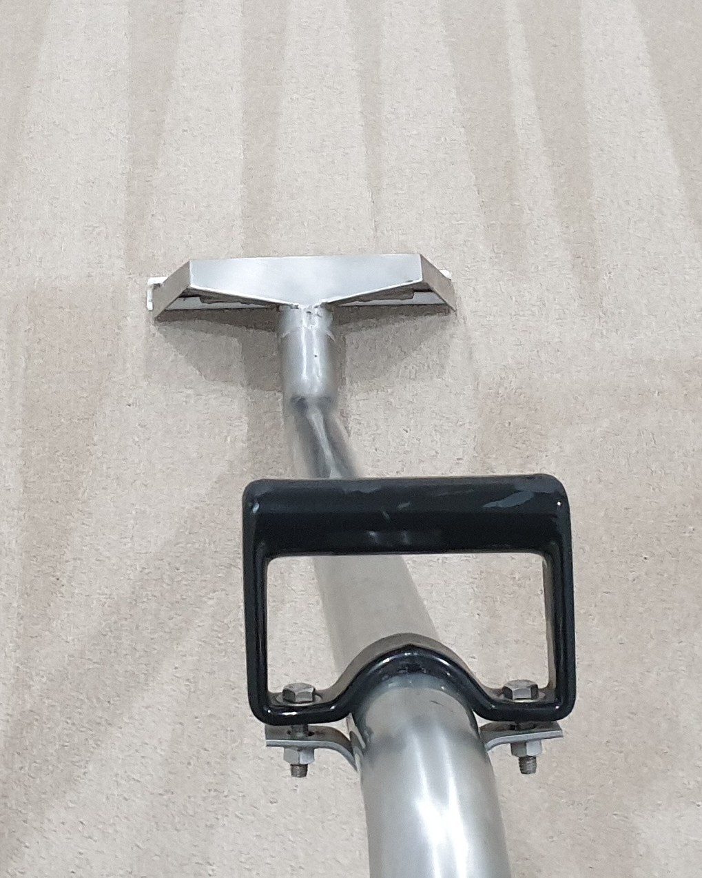 Our hot water extraction wand leaving clean stripes across cream carpet, carpet steam cleaning in Perth.