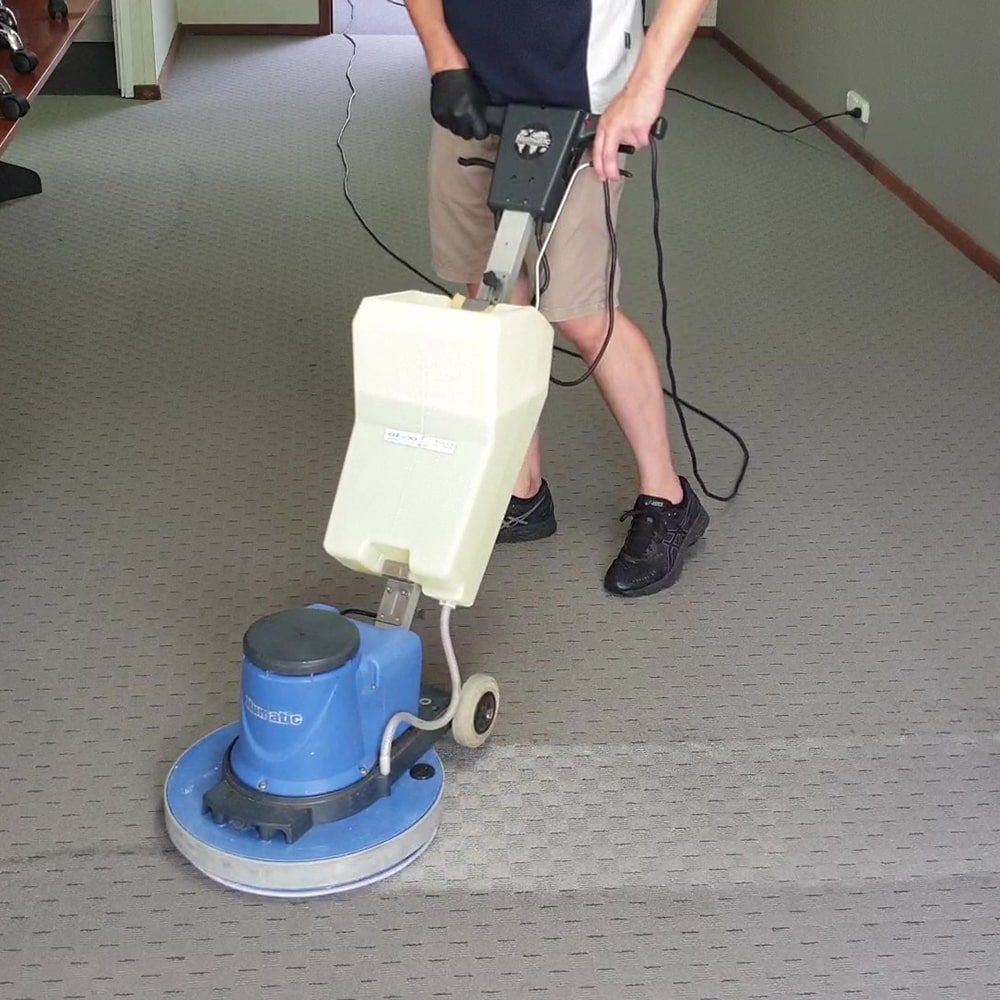 Office carpet tiles in Perth worked with our scrubbing machine, the agitation that loosens bonded soil before it is extracted.