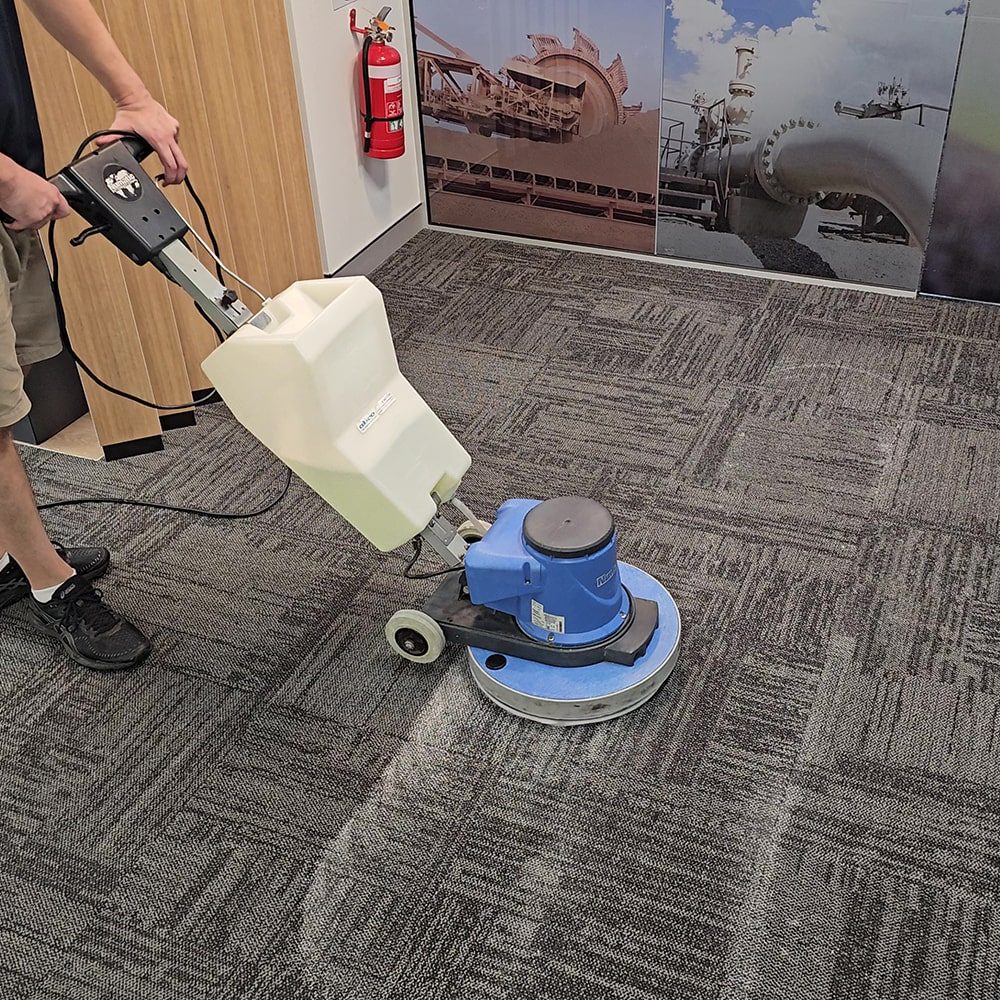 Low moisture office carpet cleaning in Perth, encapsulation on carpet tiles that puts a lightly soiled floor back in use within hours.